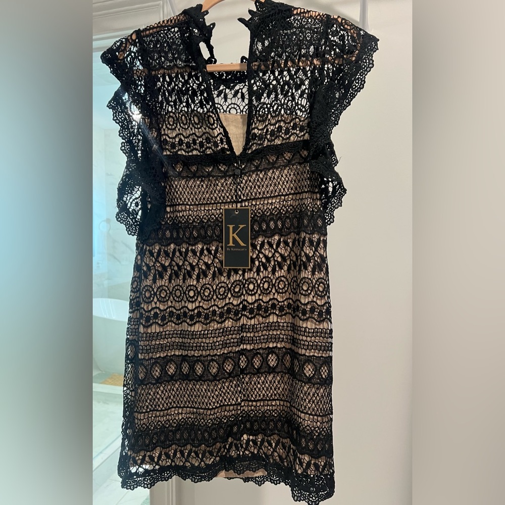 Beautiful , new with tags, black, cream , lace